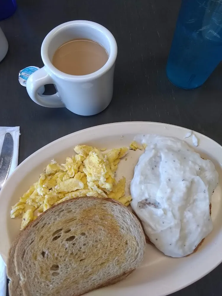 Scrambled Eggs Country Fried Steak with White Gravy and Rye Toast
